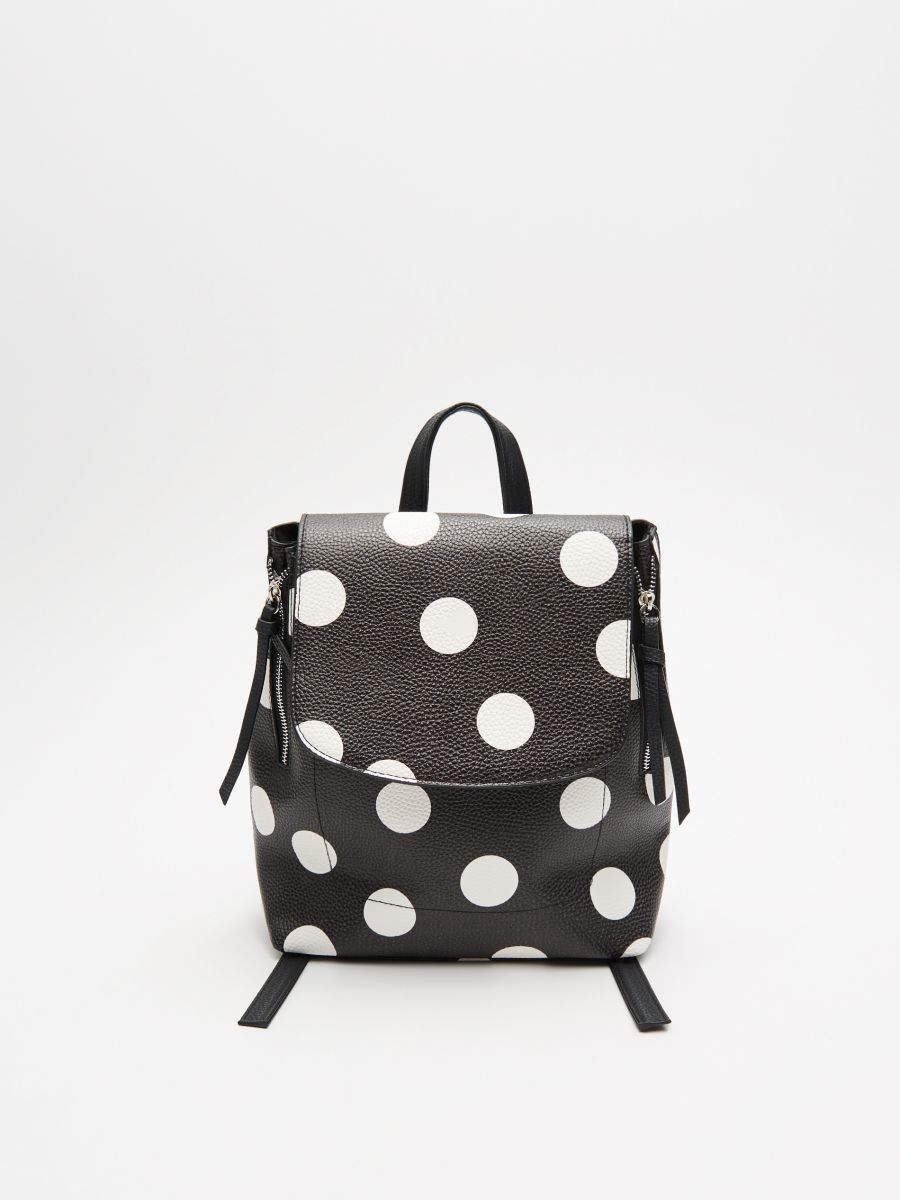 black and white polka dot backpack