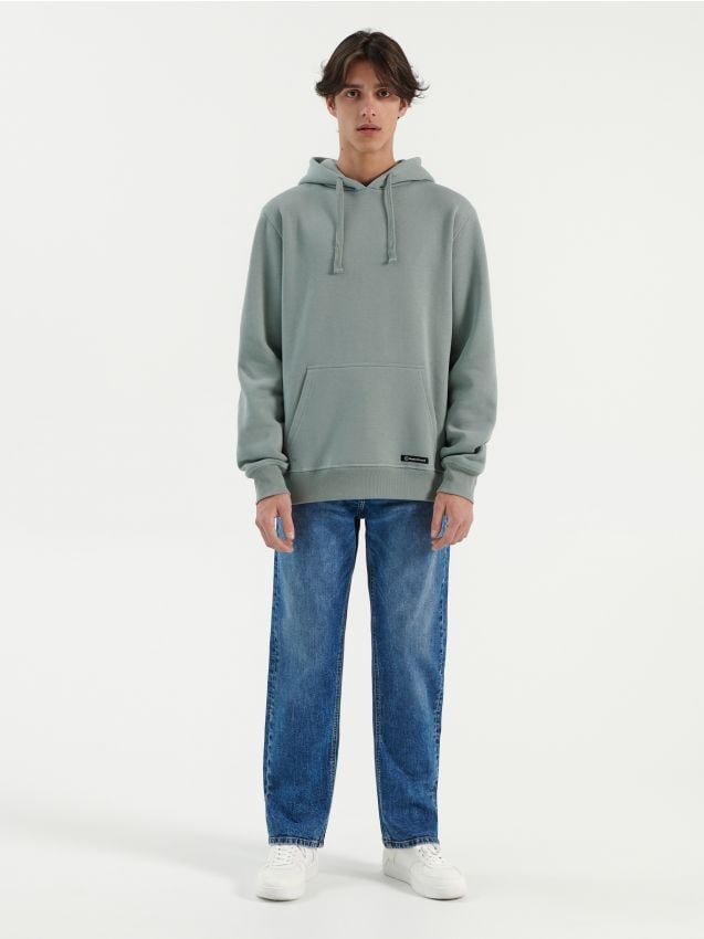 blue jeans grey hoodie