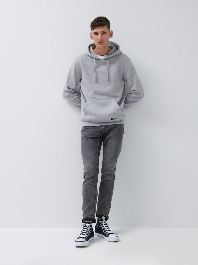 black jeans and grey hoodie